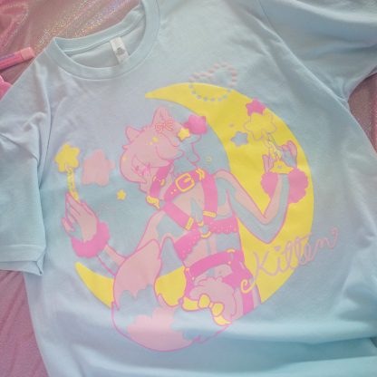 pastel blue cotton tshirt with a screen-print illustration of a magical neko boy with handcuffs and gag, and a moon in the background