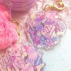 pastel acrylic charm with a neko boy wearing lingerie with a text saying "neko club"