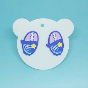 pastek eyes doll enamel pin with stars and rainbow